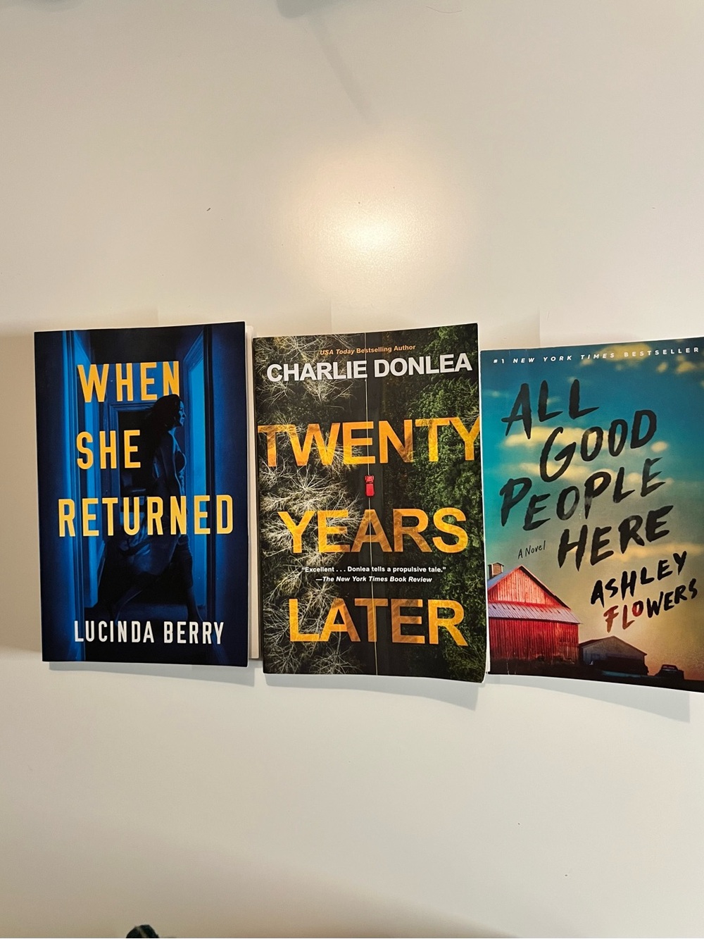 Three thriller/mystery paperback books